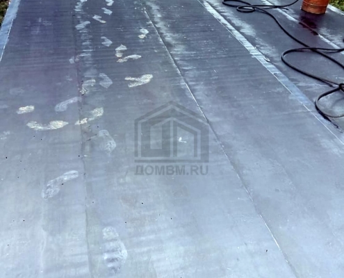 Устройство плоской кровли дома с гаражом на два автомобиля площадью 228 м2